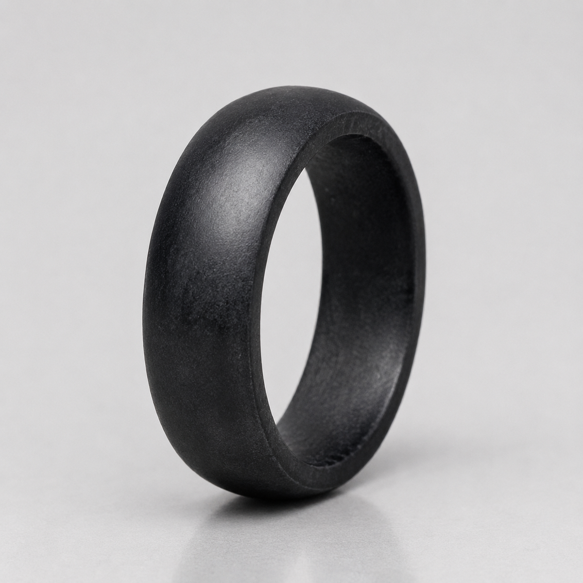 Afterdark Halo ring in its nearly black charcoal daylight finish