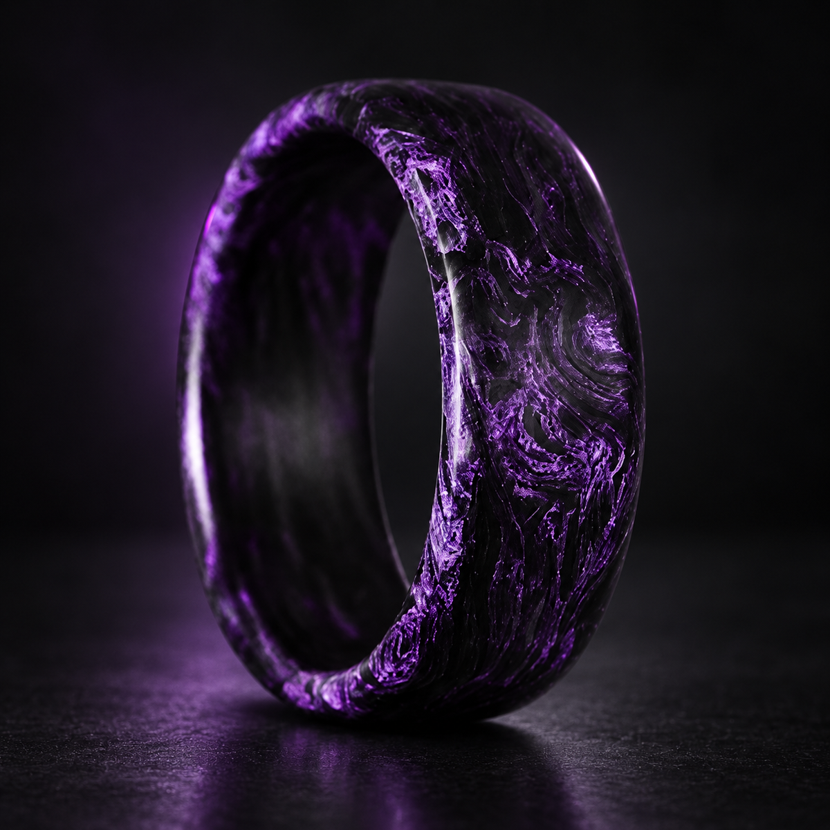 Carbon Storm Violet forged carbon fiber ring on a dark studio background